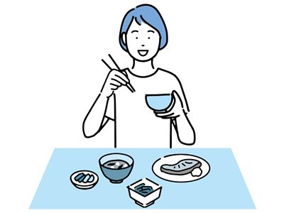 食事をする女性