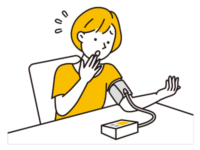 血圧を測る女性